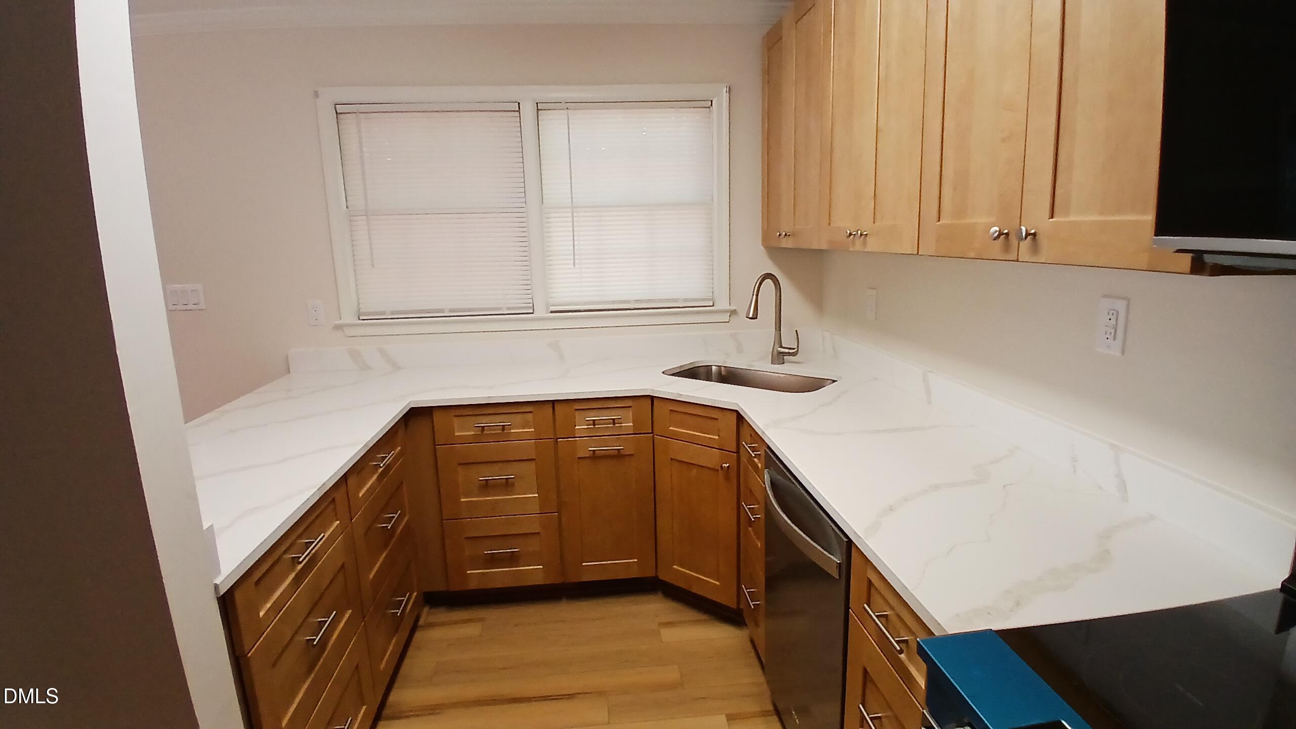 2224 Bufflehead Road Raleigh, NC 27616 - Photo 9 of 33 a view of a kitchen with sink and cabinets