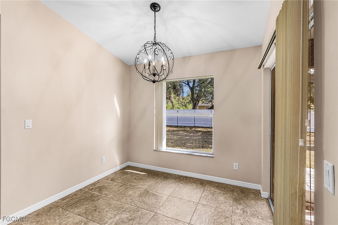 1644 Dawnview Street North Port, FL 34288 - Photo 16 of 32 a view of an empty room with a window