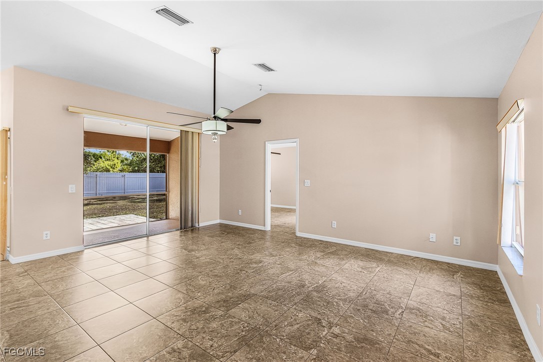 1644 Dawnview Street North Port, FL 34288 - Photo 17 of 32 a view of a kitchen with an empty space and a window