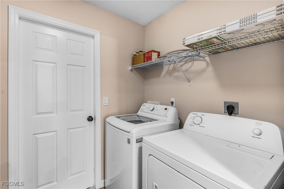 1644 Dawnview Street North Port, FL 34288 - Photo 20 of 32 a utility room with dryer and washer