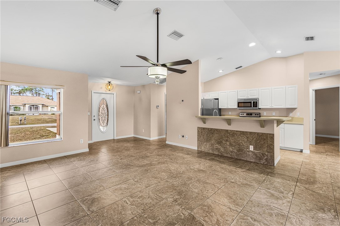 1644 Dawnview Street North Port, FL 34288 - Photo 2 of 32 a view of a kitchen with a stove cabinets and a kitchen view