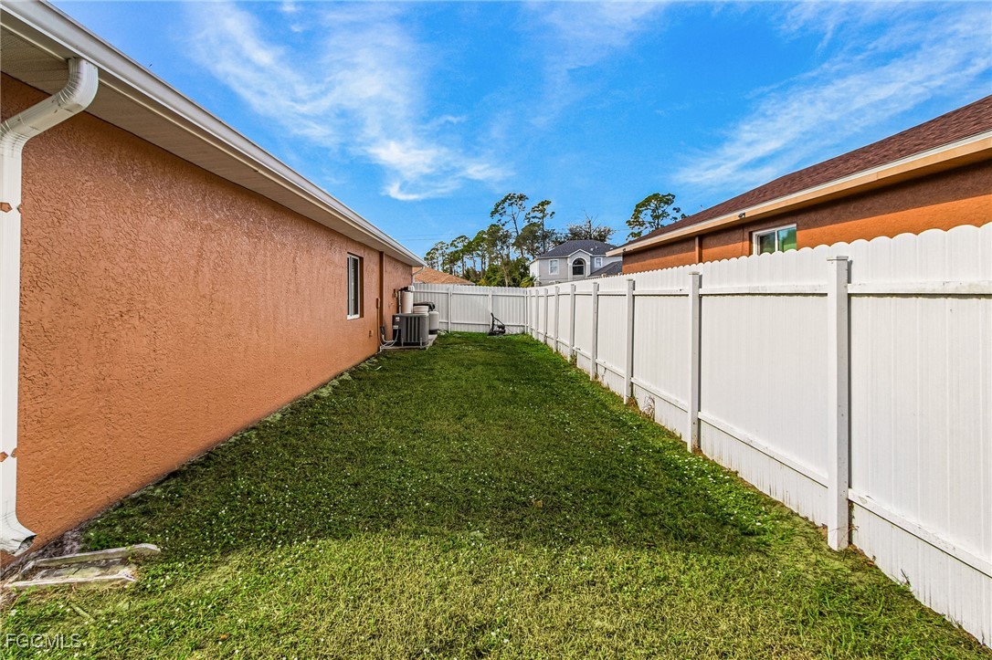 1644 Dawnview Street North Port, FL 34288 - Photo 23 of 32 a backyard with garden