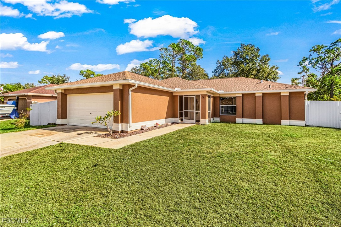 1644 Dawnview Street North Port, FL 34288 - Photo 8 of 32 a view of a house with a yard