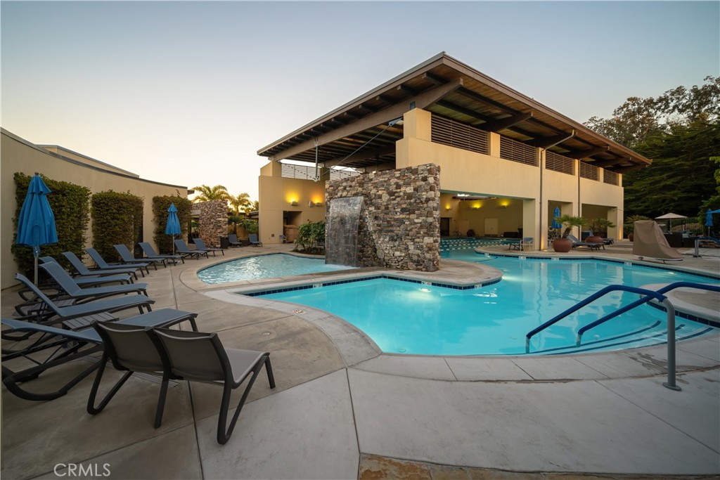 1650 Eucalyptus Road Nipomo, CA 93444 - Photo 58 of 60 a backyard of a house with table and chairs