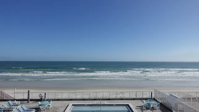 a view of a table and chairs in patio