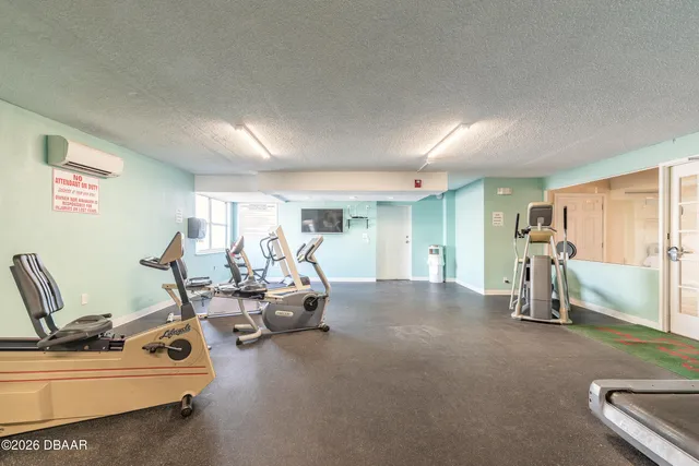 a view of a chairs and table in a patio