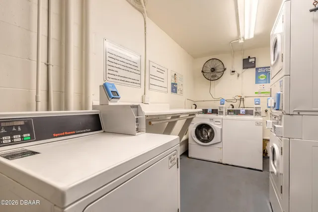 a view of swimming pool with outdoor seating and deck