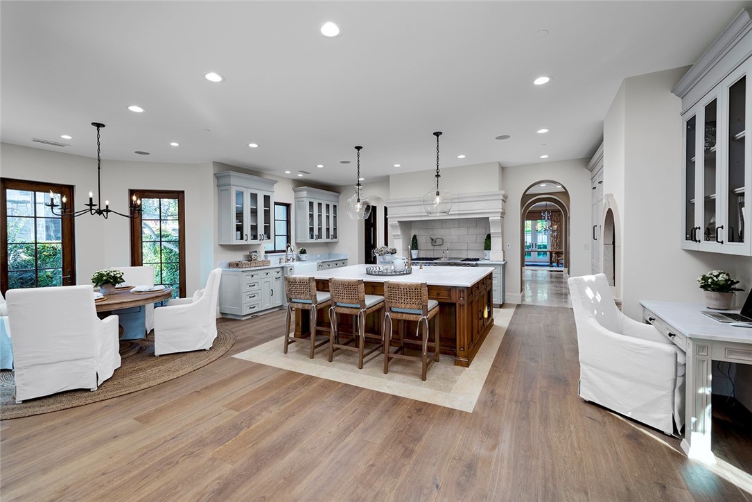 10 Fairway Point Newport Coast, CA 92657 - Photo 14 of 31 a large kitchen with a table and chairs in it