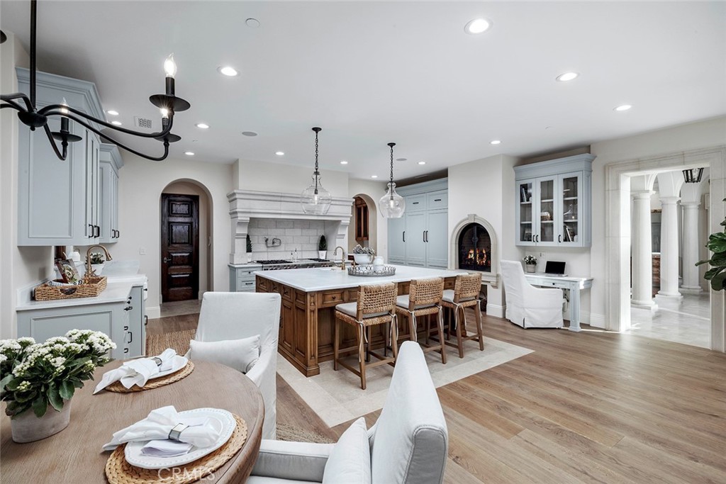 10 Fairway Point Newport Coast, CA 92657 - Photo 17 of 31 a view of a dining room with furniture and wooden floor