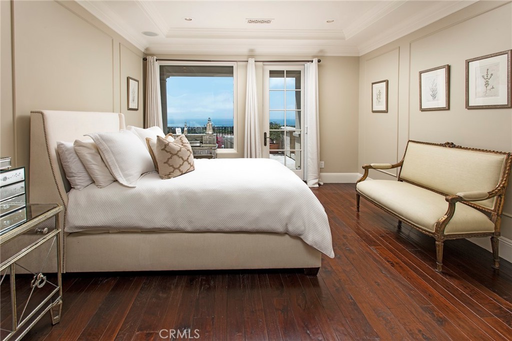 10 Fairway Point Newport Coast, CA 92657 - Photo 24 of 31 a bedroom with a bed couch and a window