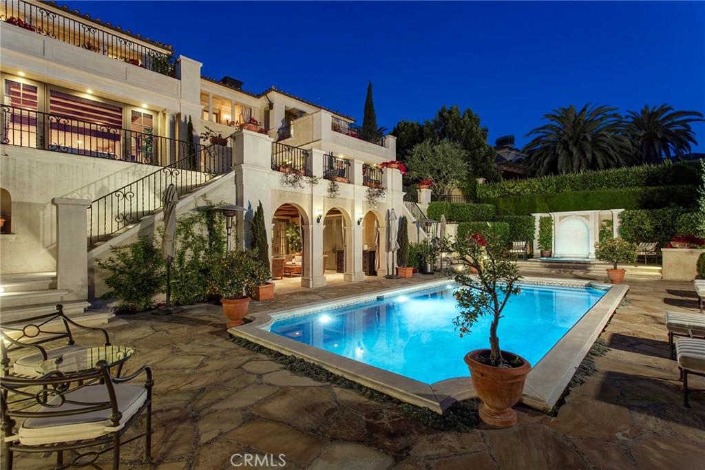 10 Fairway Point Newport Coast, CA 92657 - Photo 27 of 31 a view of a swimming pool with sitting area