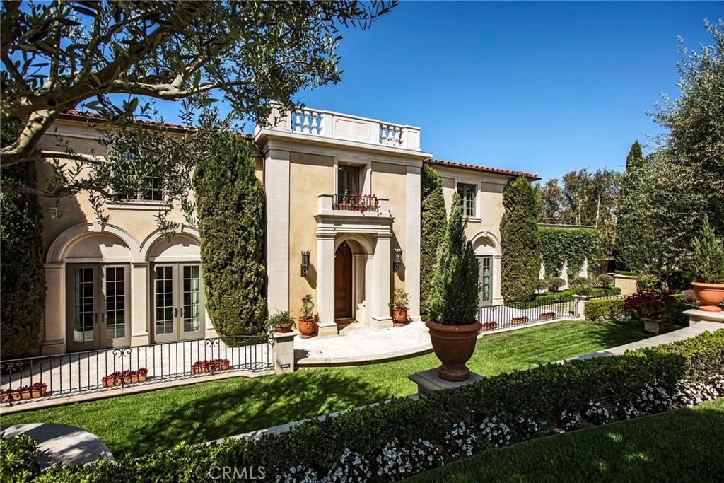 10 Fairway Point Newport Coast, CA 92657 - Photo 3 of 31 a front view of a house with garden