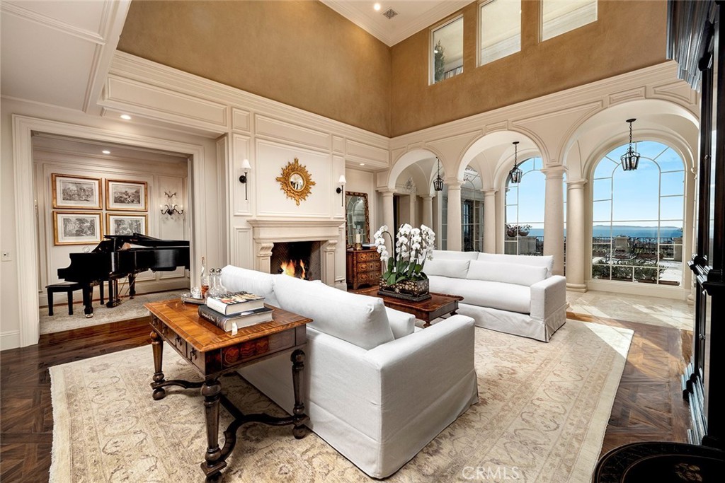 10 Fairway Point Newport Coast, CA 92657 - Photo 5 of 31 a living room with furniture fireplace and a fireplace