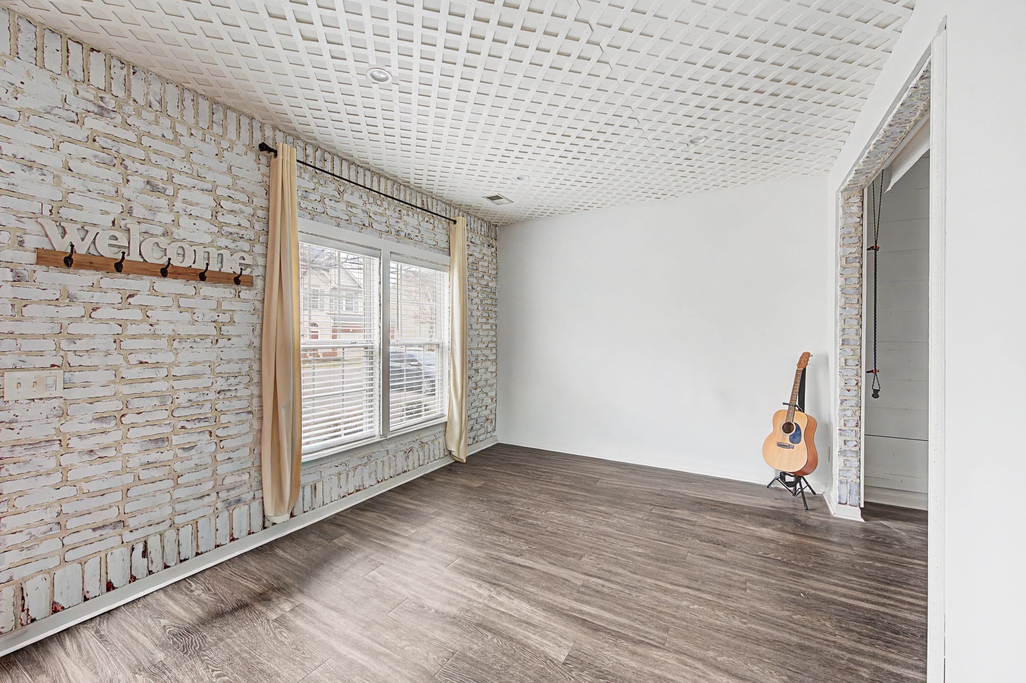 3401 Anderson Road, Unit 4 Antioch, TN 37013 - Photo 15 of 55 a view of an empty room with wooden floor and a window