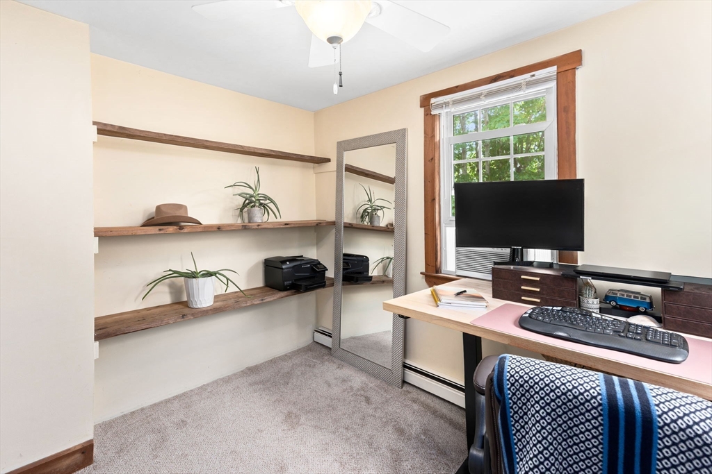 1020 Old Falmouth Road Barnstable, MA 02632 - Photo 34 of 42 a room with furniture and a flat screen tv