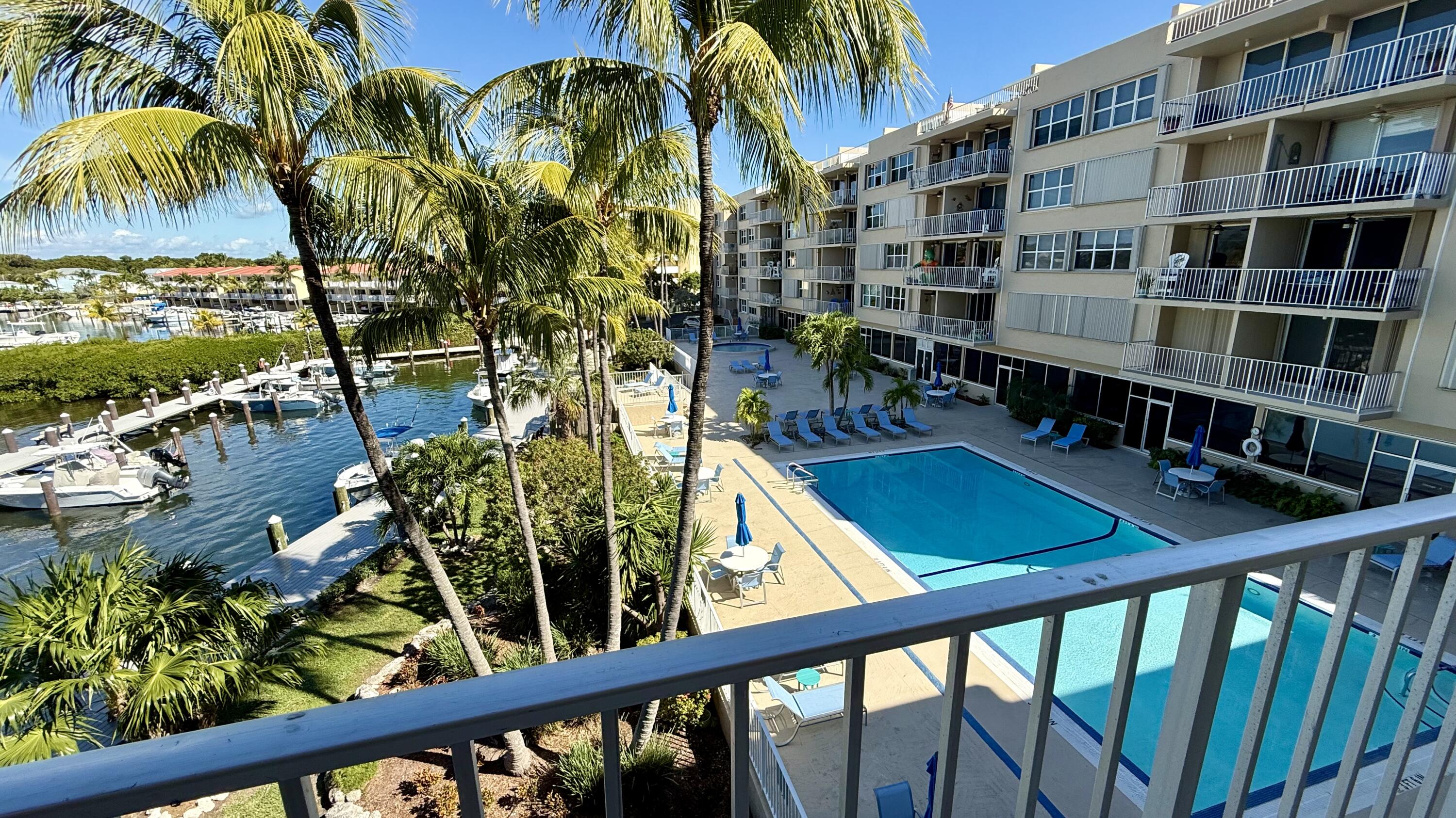 88500 Overseas Highway, Unit 320 Islamorada, FL 33036 - Photo 3 of 30 a view of swimming pool from a balcony