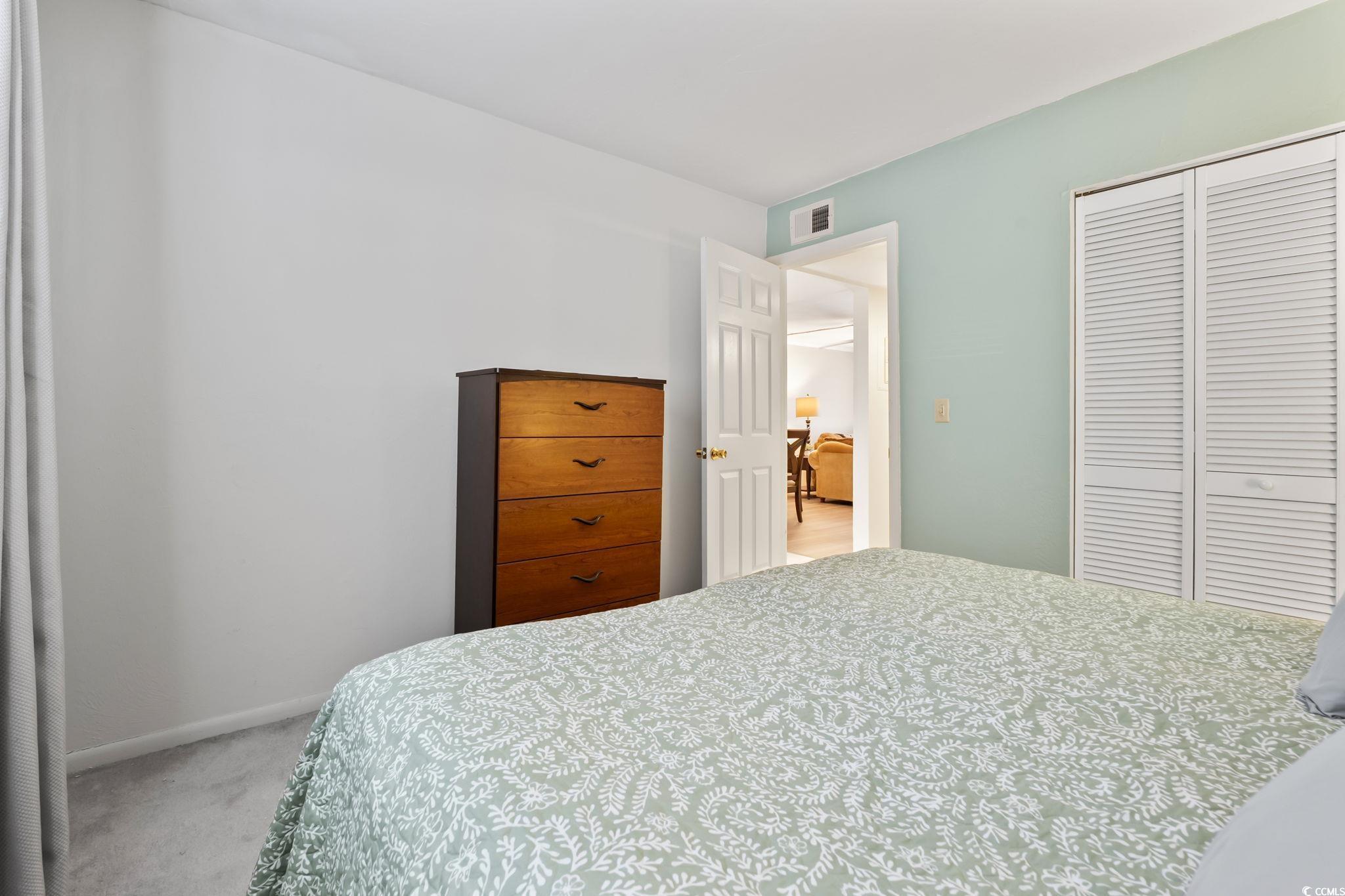 1301 Pridgen Road, Unit 304 Myrtle Beach, SC 29577 - Photo 19 of 26 Spacious closet featuring light carpet
