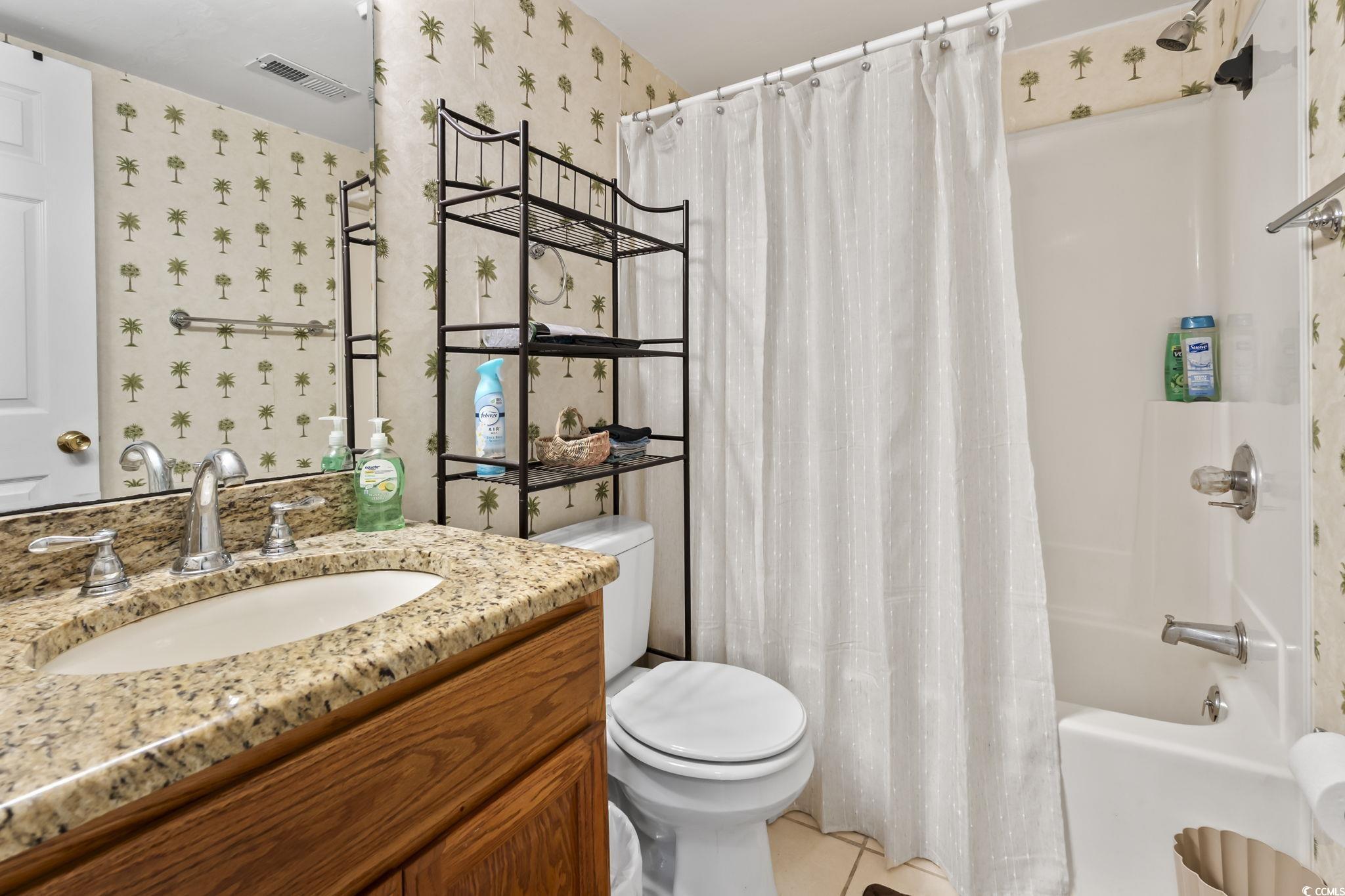 1301 Pridgen Road, Unit 304 Myrtle Beach, SC 29577 - Photo 20 of 26 Bathroom featuring vanity and a shower stall