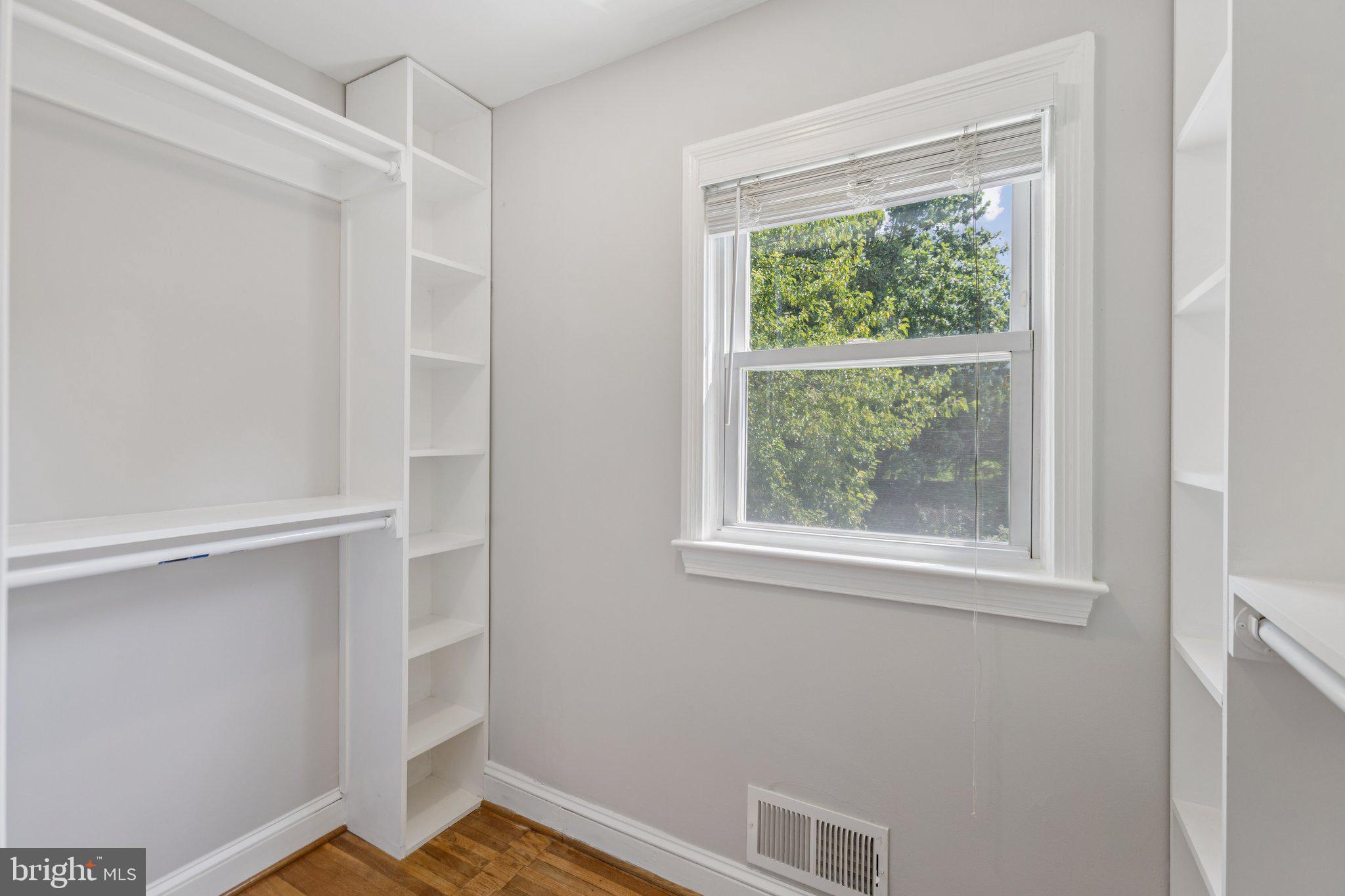 1718 Dublin Drive Silver Spring, MD 20902 - Photo 14 of 25 a view of an empty room with a window