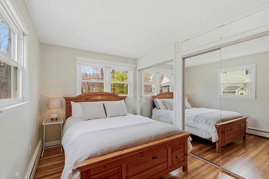 46 Plum Street Hamilton, MA 01982 - Photo 11 of 23 a bedroom with two beds and a window