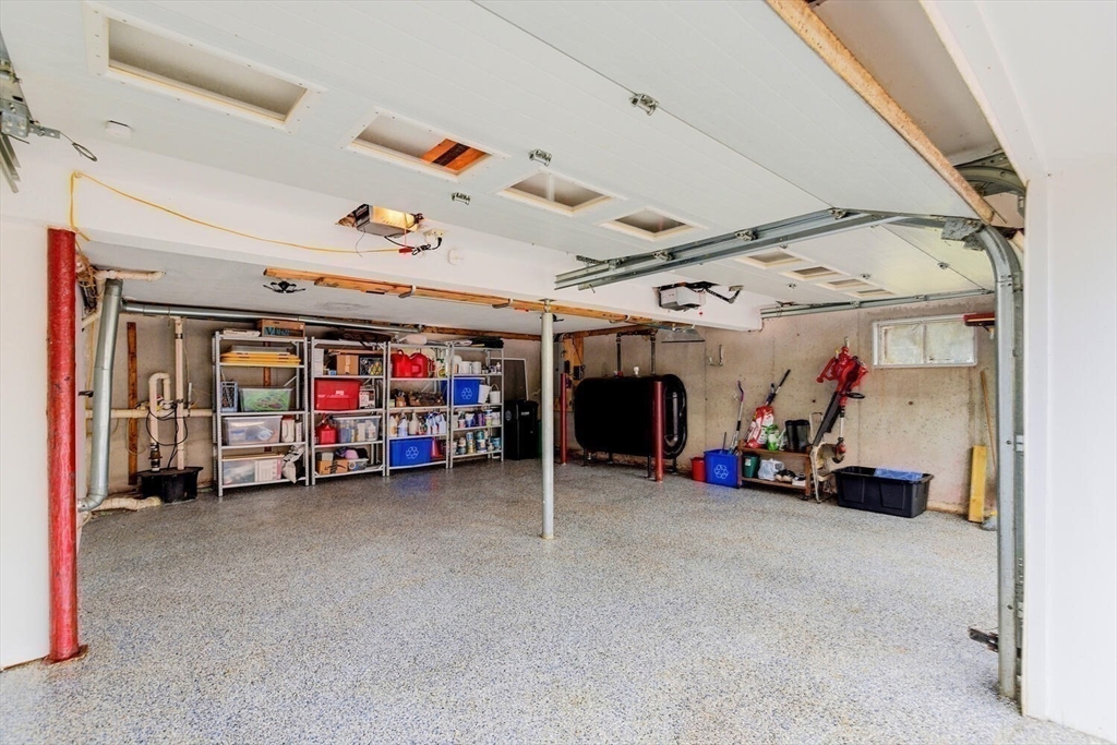 46 Plum Street Hamilton, MA 01982 - Photo 18 of 23 a view of a garage with gym equipment