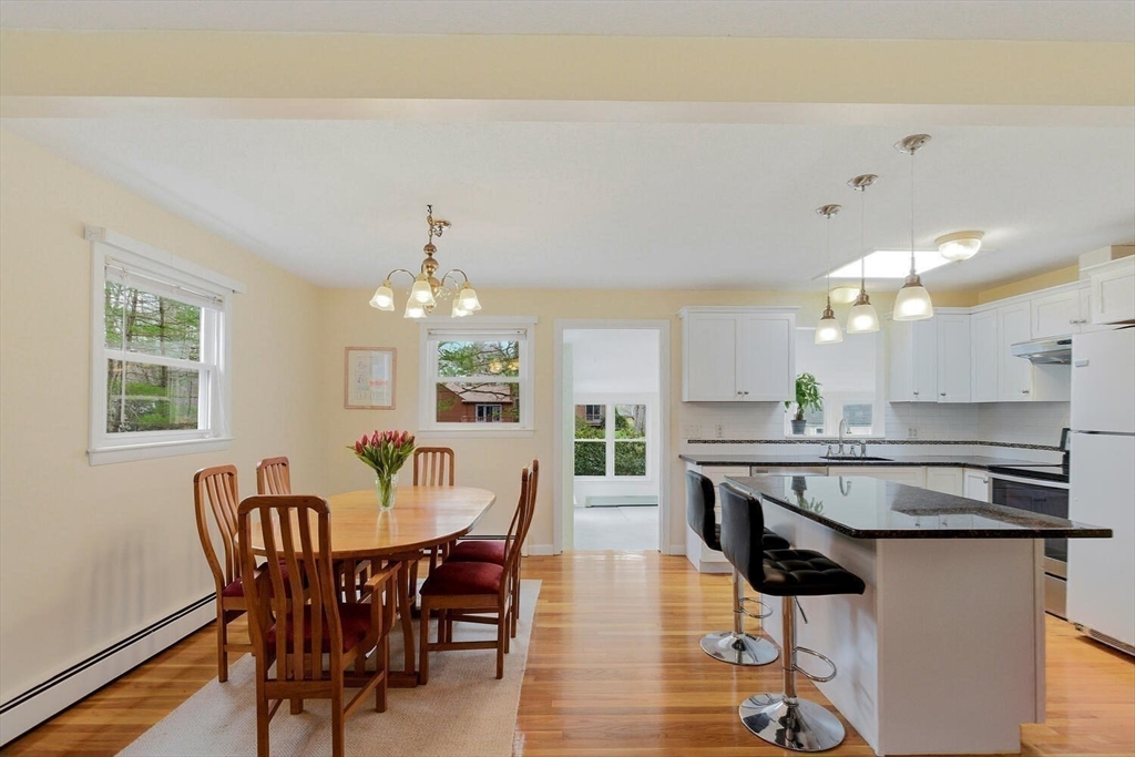 46 Plum Street Hamilton, MA 01982 - Photo 4 of 23 a view of a dining room with furniture window and wooden floor