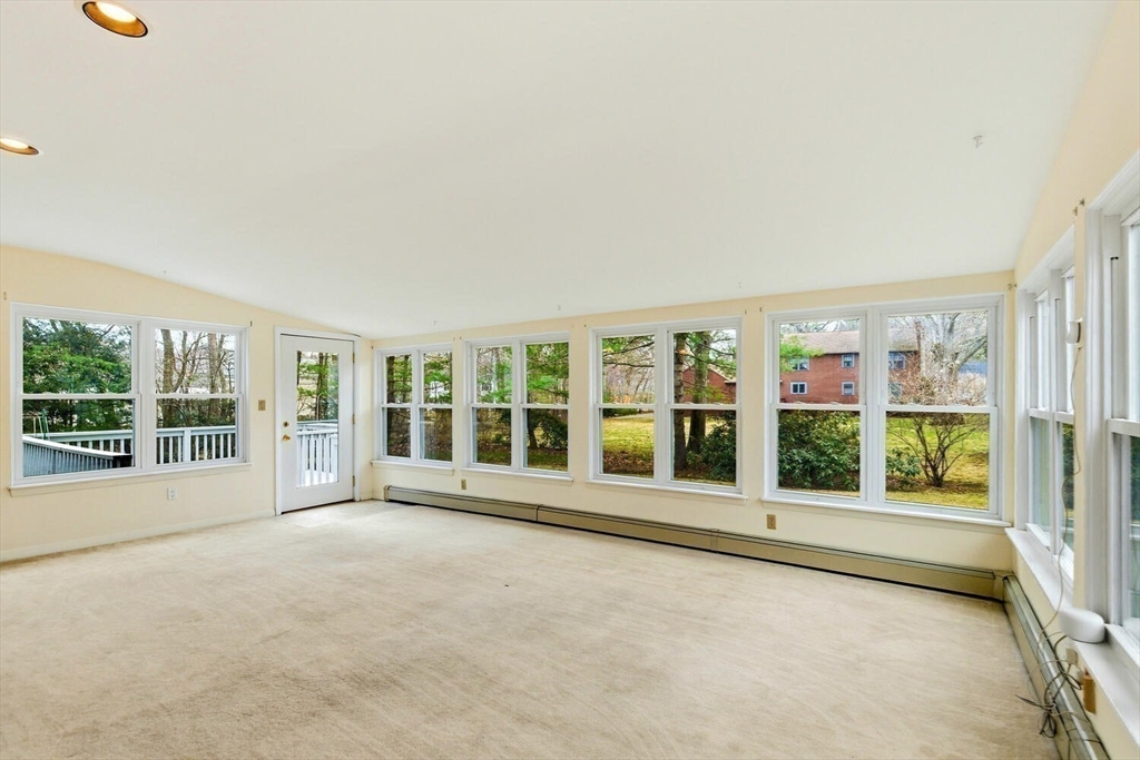 46 Plum Street Hamilton, MA 01982 - Photo 9 of 23 a view of an empty room with a large window