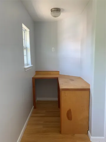 a view of room with window and stairs