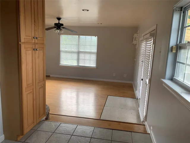 an empty room with windows