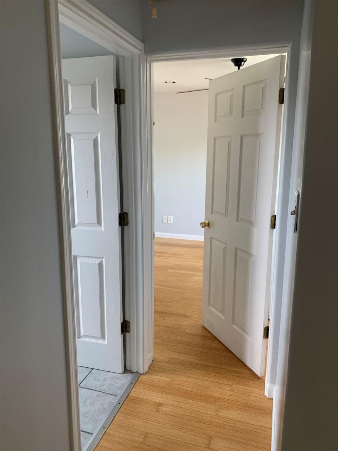 213 1st Street, Unit B Galveston, TX 77550 - Photo 9 of 16 a view of a bathroom from a hallway