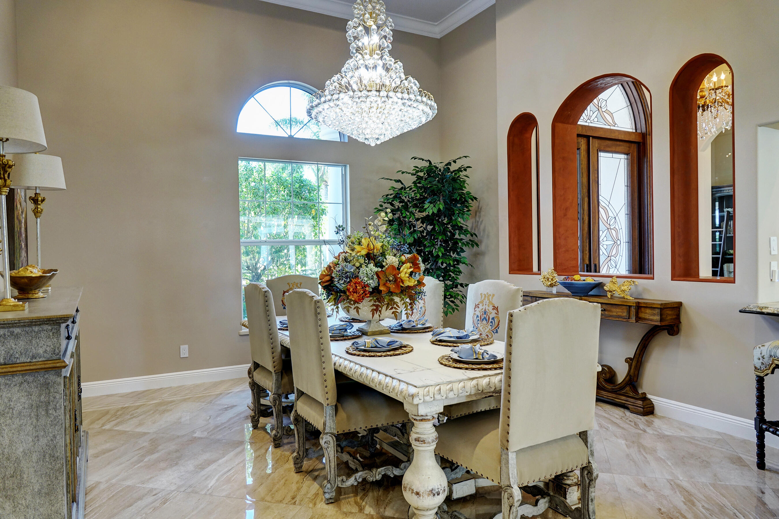 2690 Northwest Collins Cove Road Stuart, FL 34994 - Photo 11 of 78 a view of a dining room with furniture window and wooden floor
