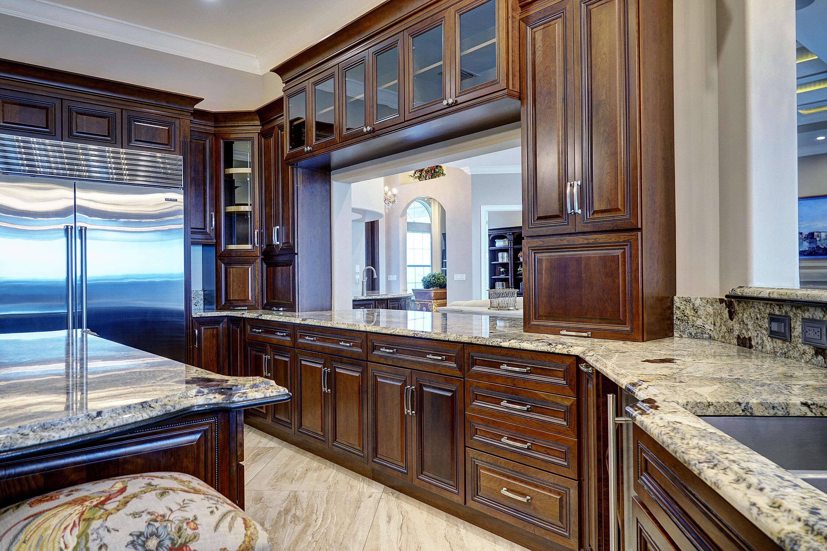 2690 Northwest Collins Cove Road Stuart, FL 34994 - Photo 24 of 78 a spacious bathroom with a granite countertop sink and a mirror
