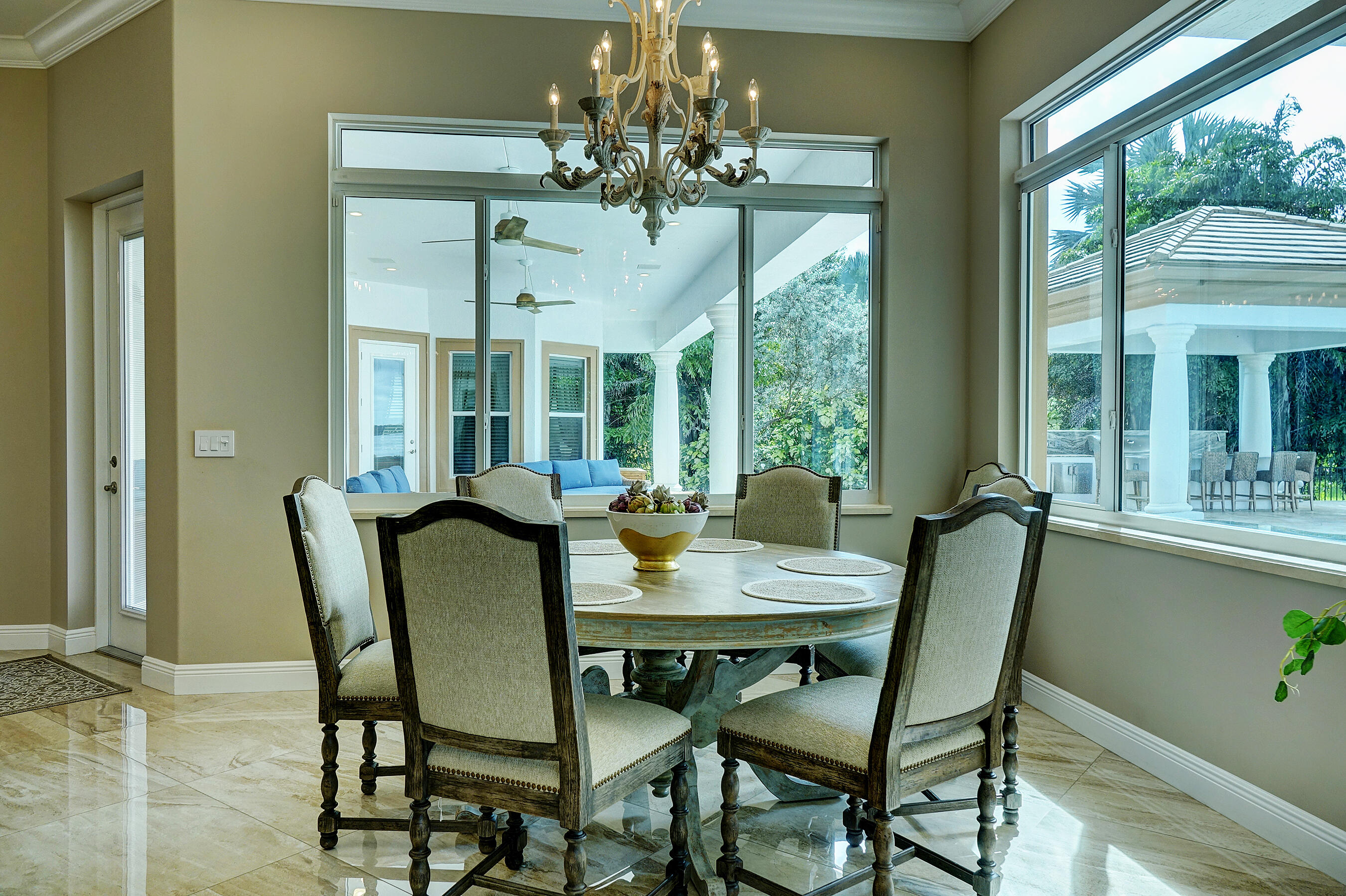 2690 Northwest Collins Cove Road Stuart, FL 34994 - Photo 27 of 78 a view of a dining room with furniture window and outside view