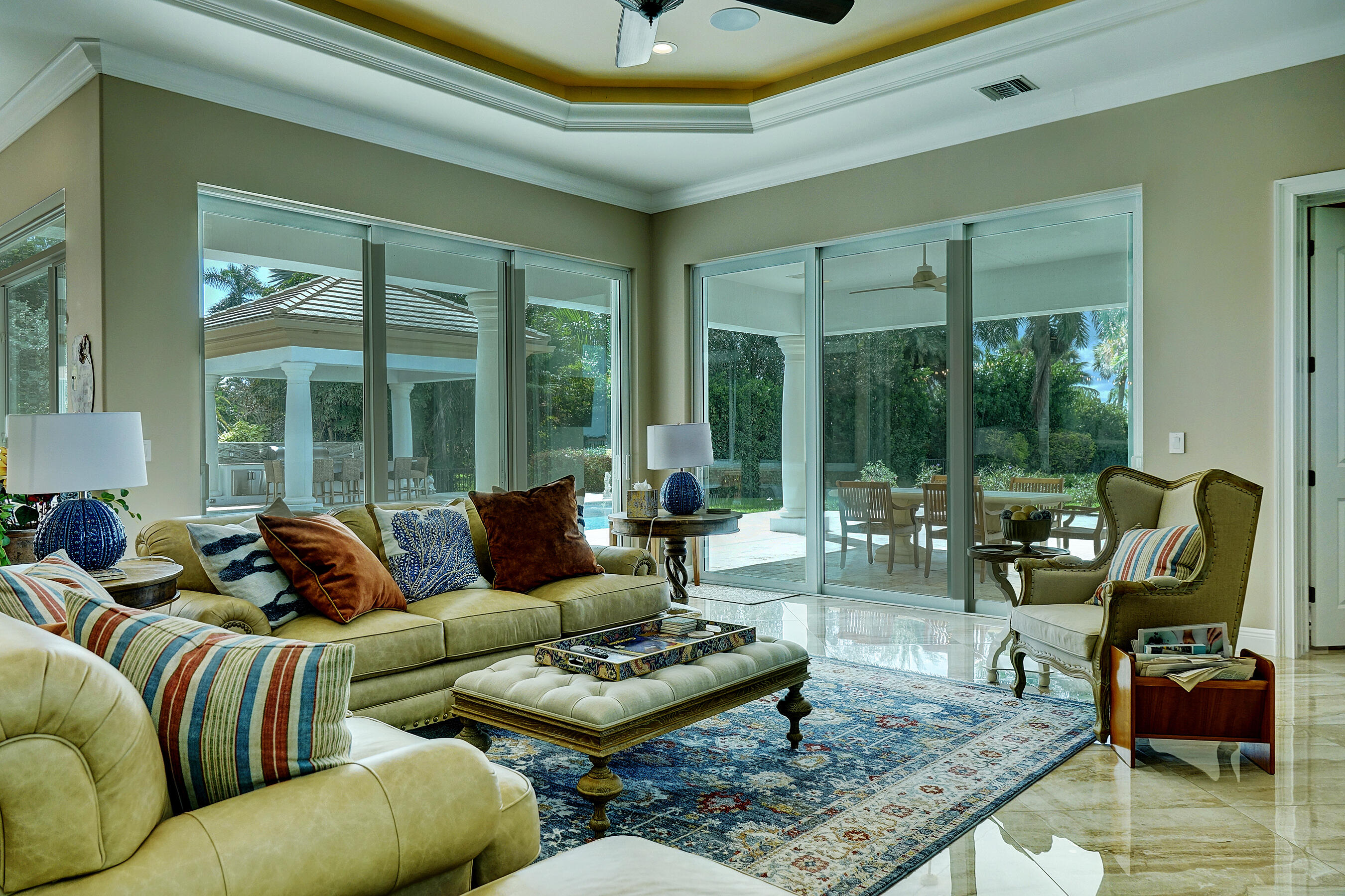 2690 Northwest Collins Cove Road Stuart, FL 34994 - Photo 28 of 78 a living room with furniture and a large window