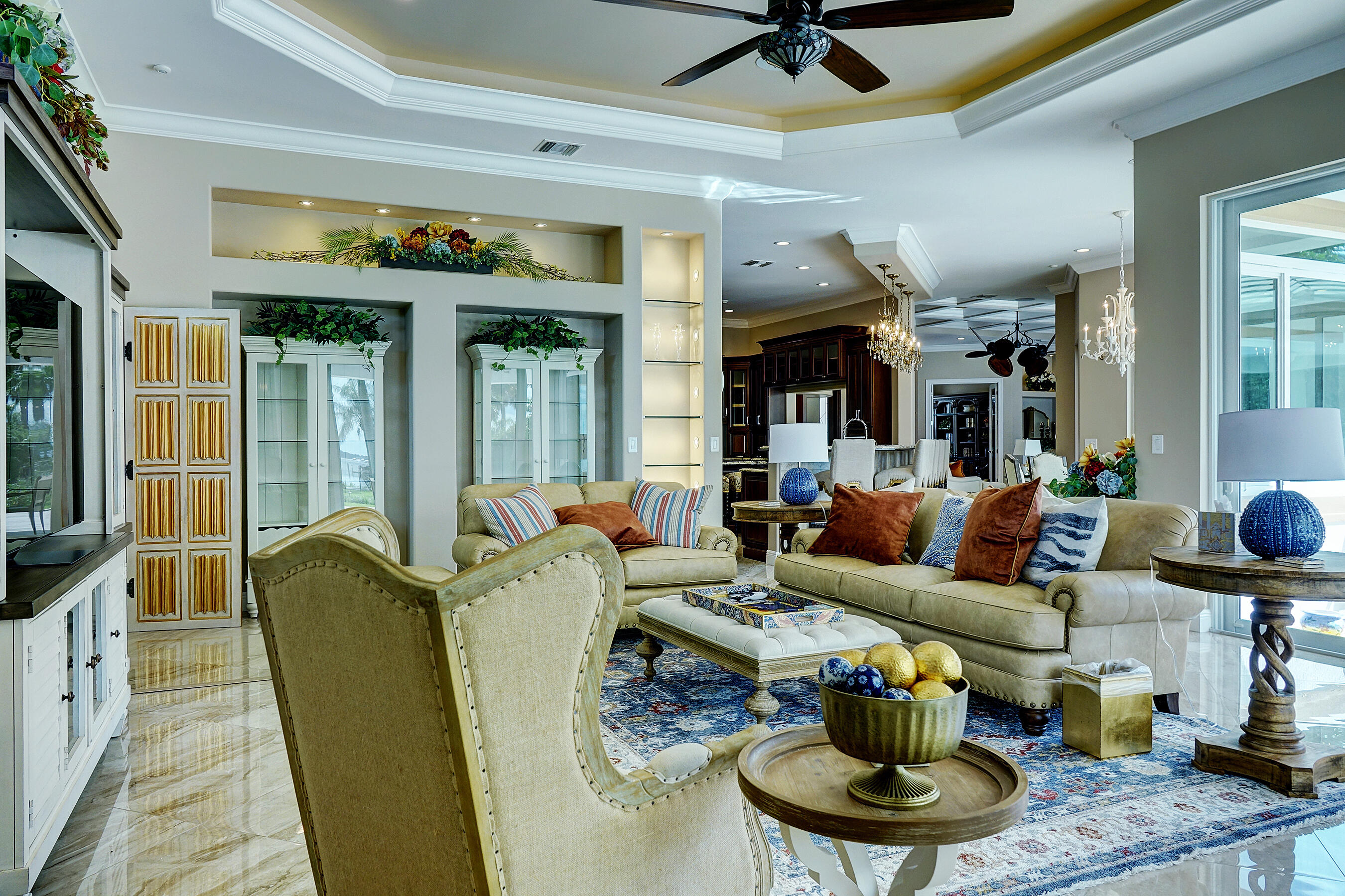 2690 Northwest Collins Cove Road Stuart, FL 34994 - Photo 29 of 78 a living room with furniture and a fireplace