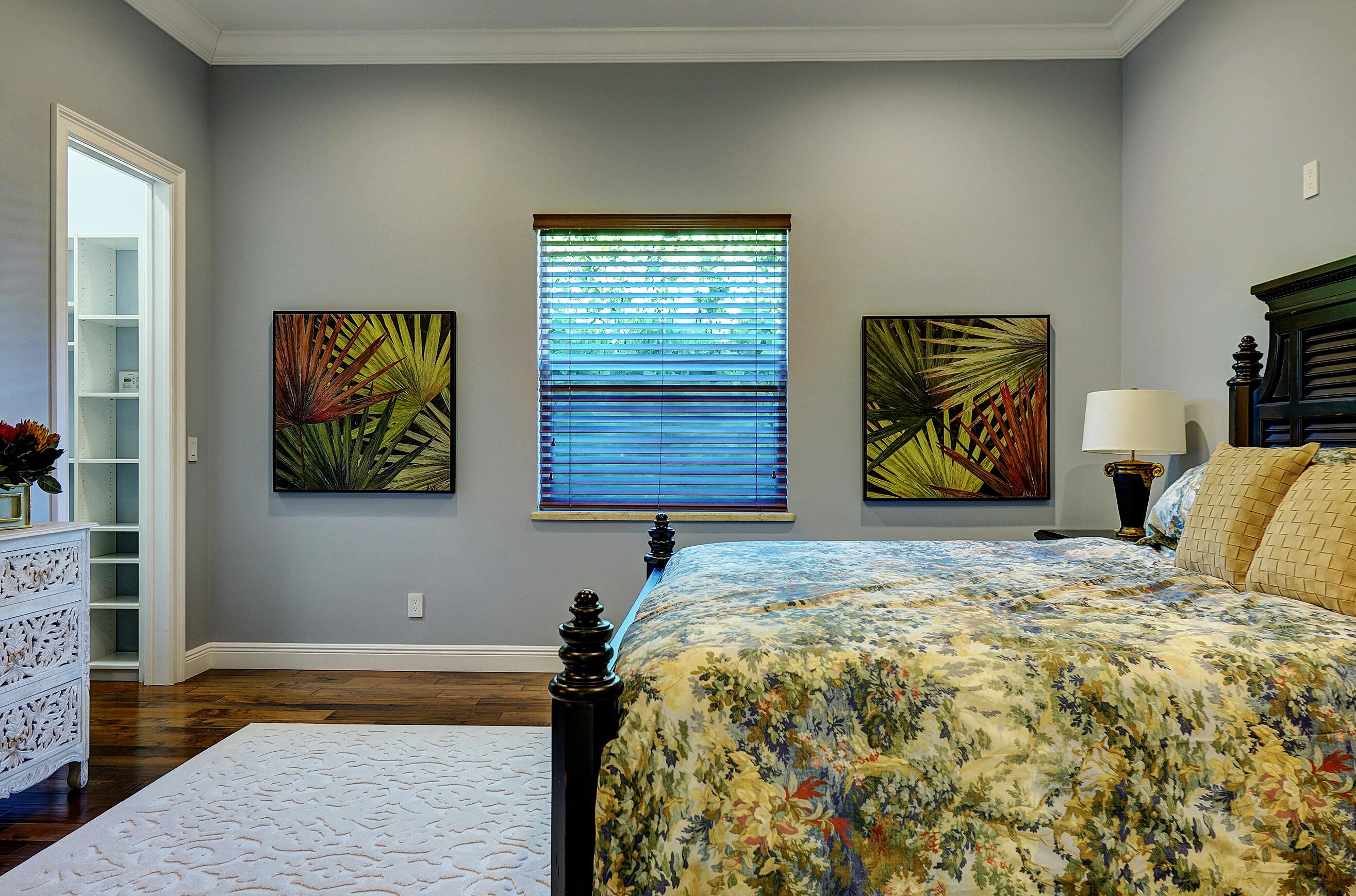 2690 Northwest Collins Cove Road Stuart, FL 34994 - Photo 42 of 78 a bedroom with a bed and a window