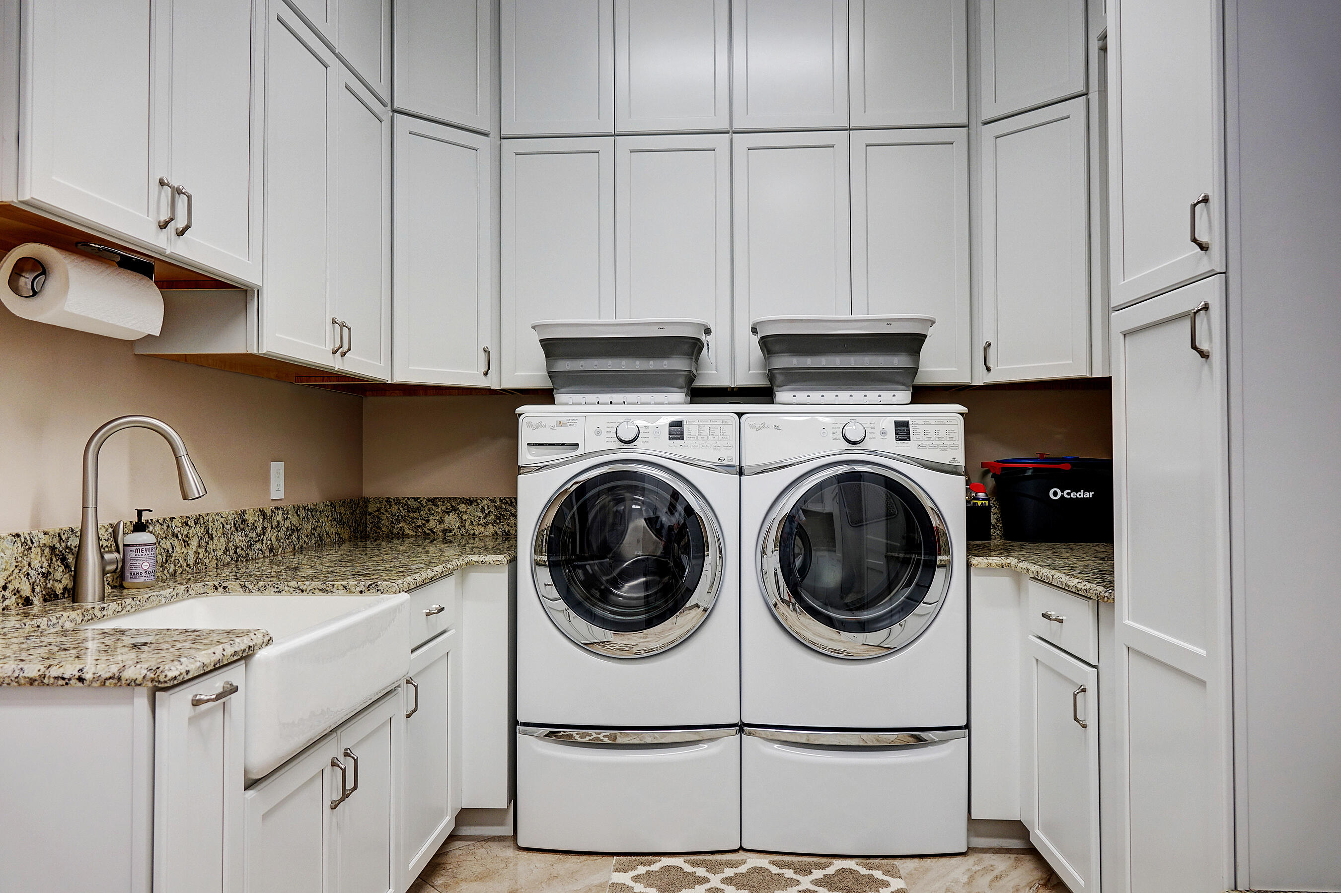 2690 Northwest Collins Cove Road Stuart, FL 34994 - Photo 46 of 78 a utility room with sink dryer and washer