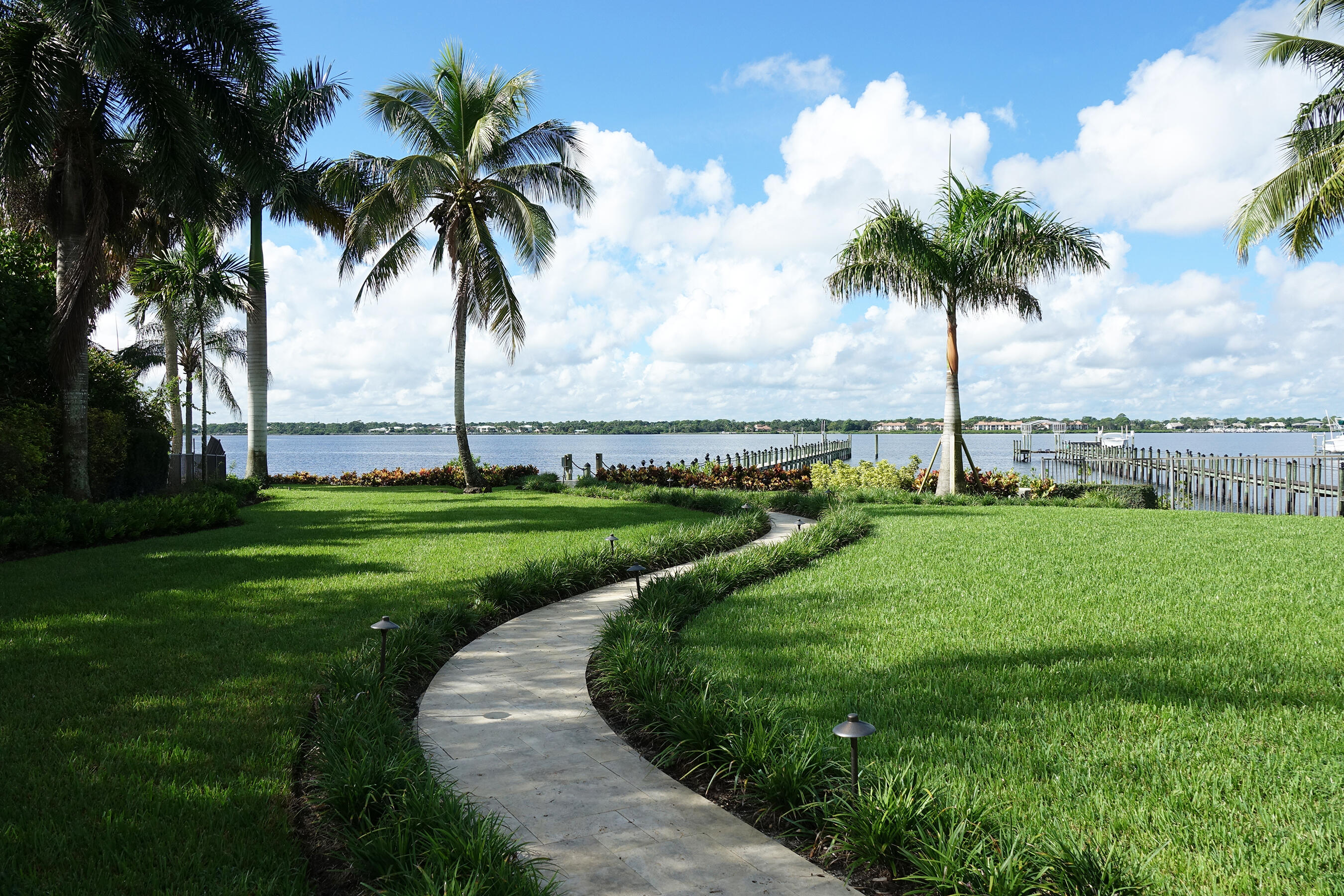 2690 Northwest Collins Cove Road Stuart, FL 34994 - Photo 7 of 78 a view of a park and palm trees