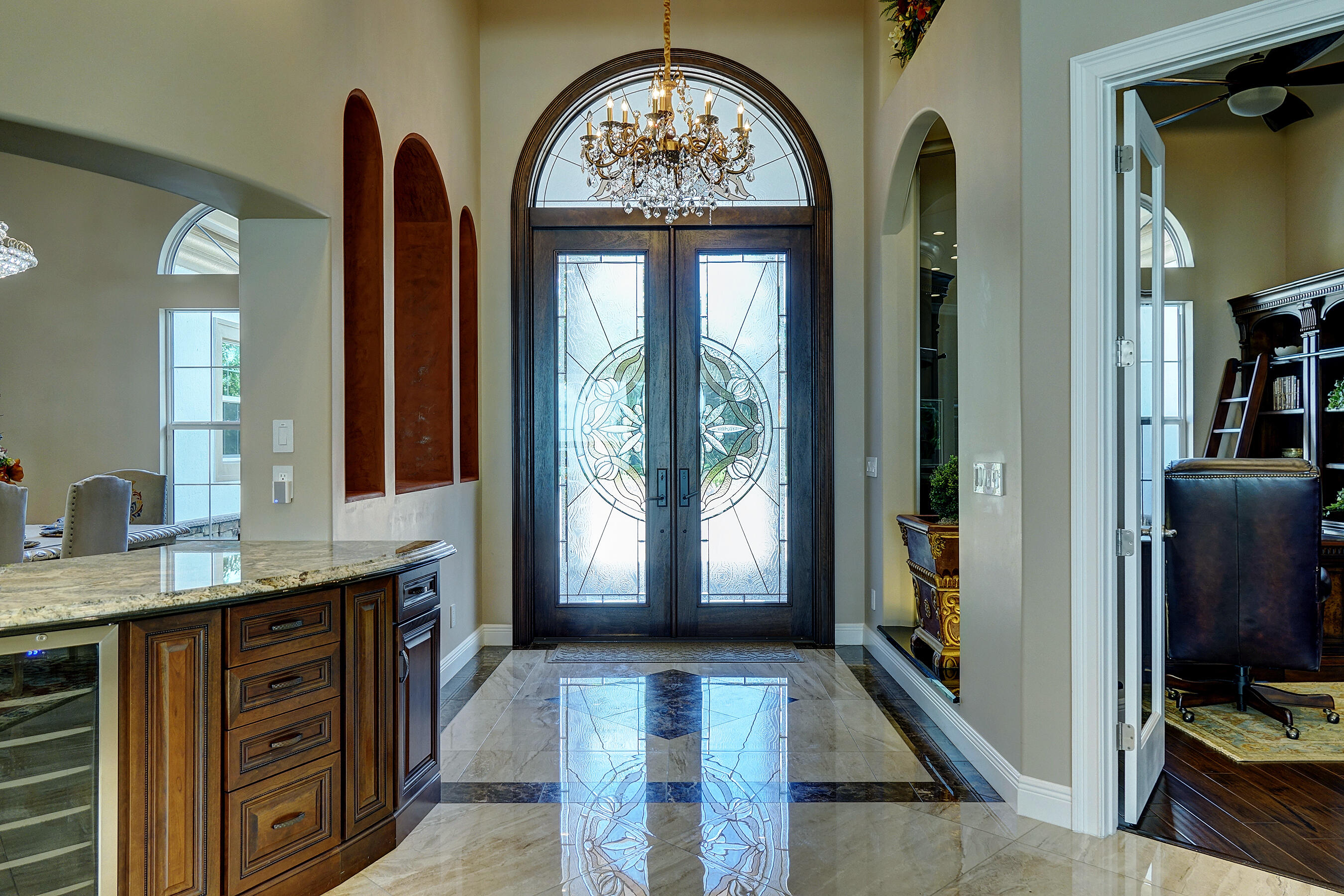 2690 Northwest Collins Cove Road Stuart, FL 34994 - Photo 9 of 78 a view of hall way with mirror and furniture