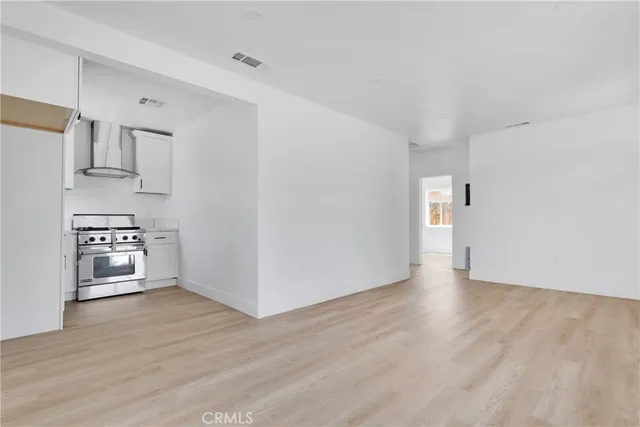 a view of kitchen with wooden floor