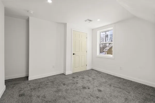 a view of a house with a wooden floor