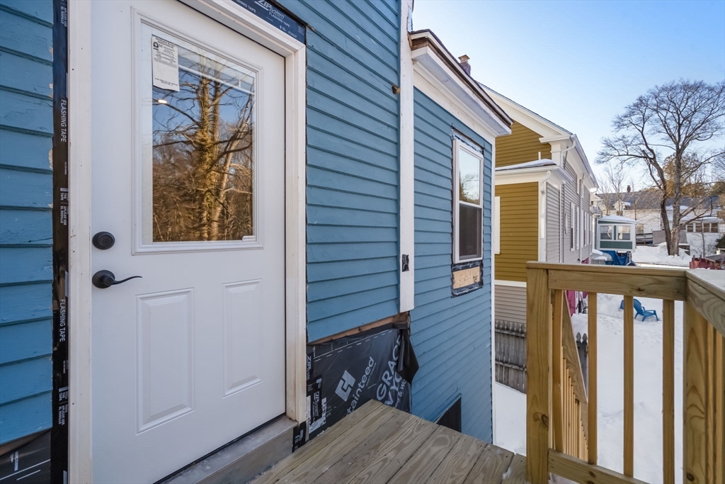 99 Main Street, Unit A Upton, MA 01568 - Photo 19 of 21 a view of a house with a wooden floor