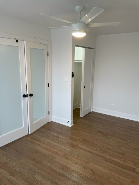 7529 North Maplewood Avenue, Unit 7B Chicago, IL 60645 - Photo 10 of 10 a view of an empty room with wooden floor