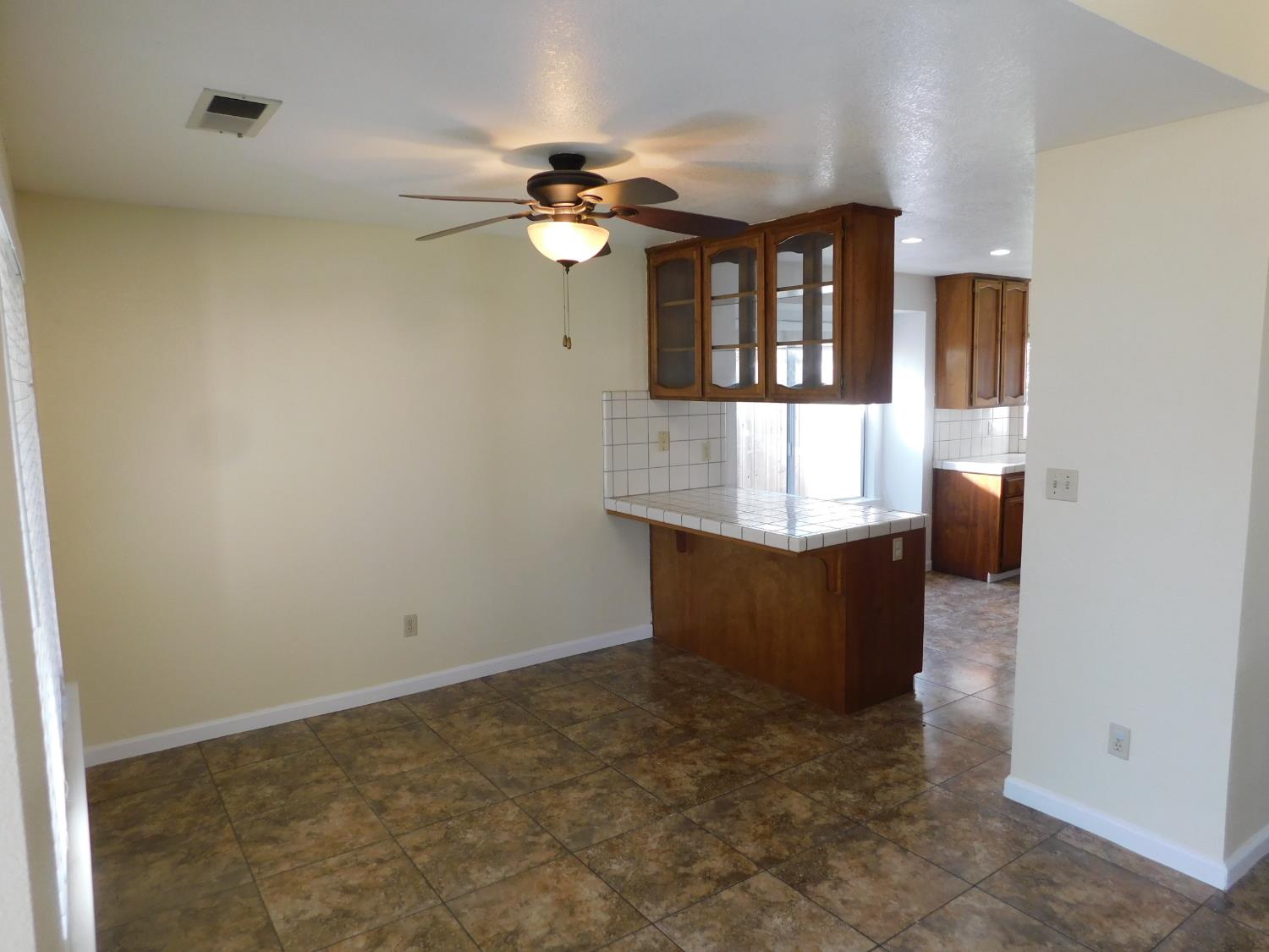 2316 Mountain Quail Way Modesto, CA 95355 - Photo 12 of 49 a view of entryway with kitchen