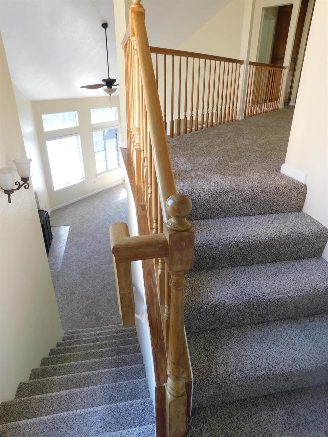 2316 Mountain Quail Way Modesto, CA 95355 - Photo 18 of 49 a view of entryway and hall with wooden floor