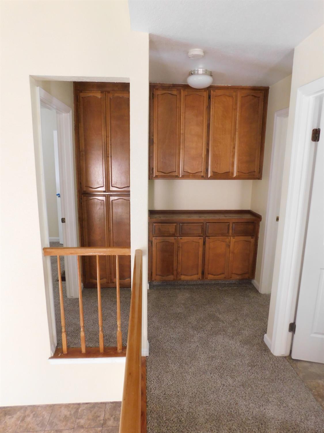 2316 Mountain Quail Way Modesto, CA 95355 - Photo 27 of 49 a view of kitchen with wooden floor and electronic appliances