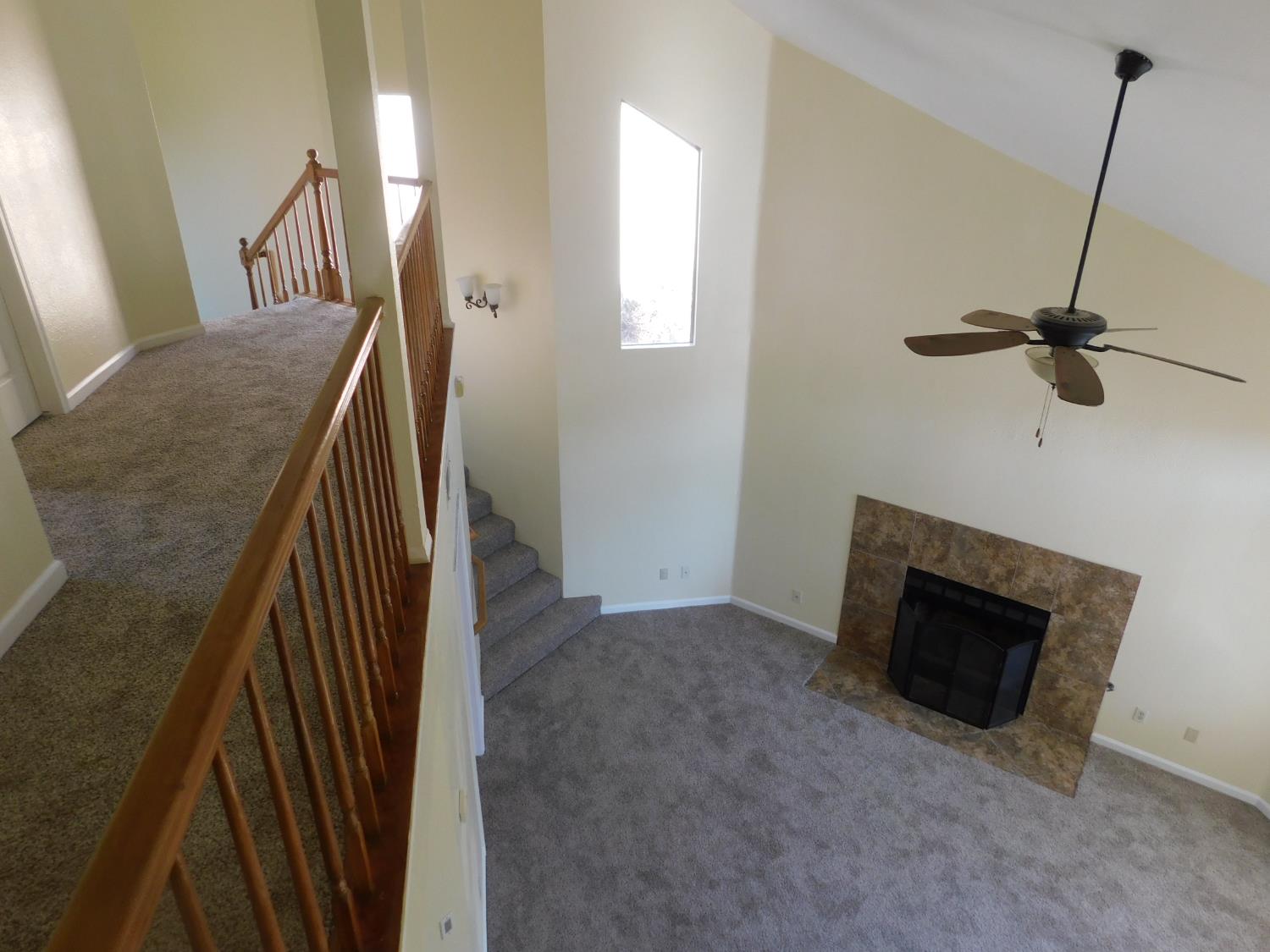 2316 Mountain Quail Way Modesto, CA 95355 - Photo 36 of 49 a view of a livingroom with furniture and staircase