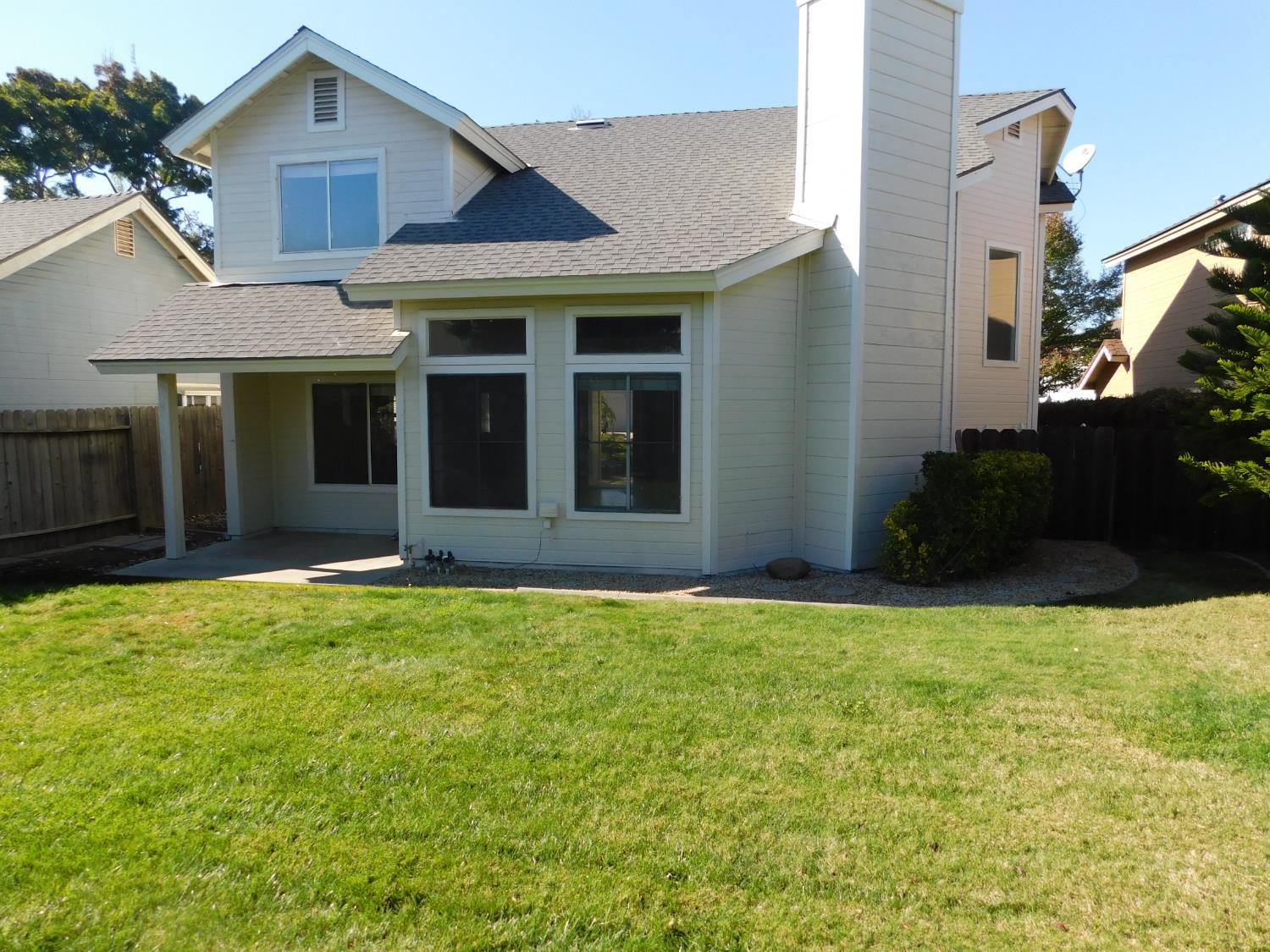 2316 Mountain Quail Way Modesto, CA 95355 - Photo 45 of 49 a view of a house with backyard garden and trees
