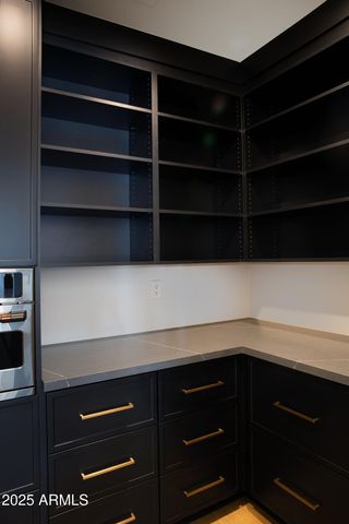 a bed room with a bed and glass door