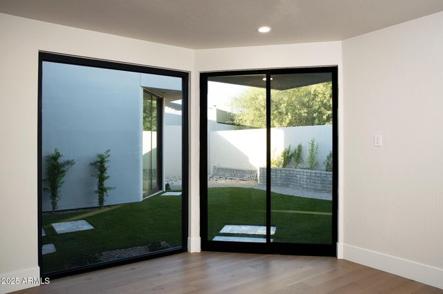a bathroom with a sink a double vanity and a mirror